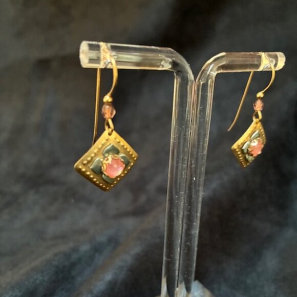 Dangling gold tone earrings with pink and green flowers. - Picture 3 of 4
